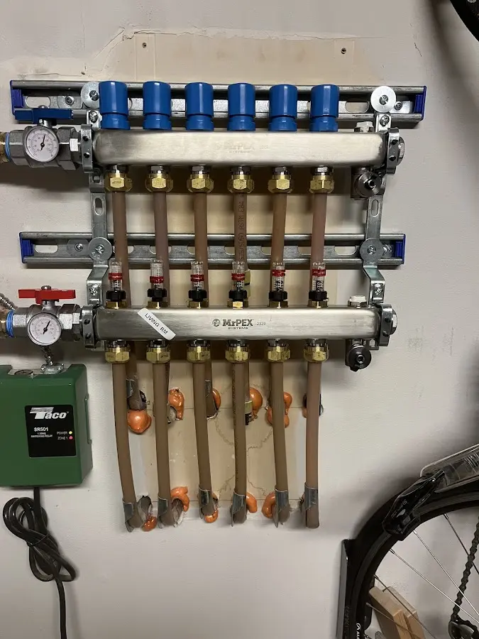 Plumber performing Water Heater Repair at a residential property in Wallburg